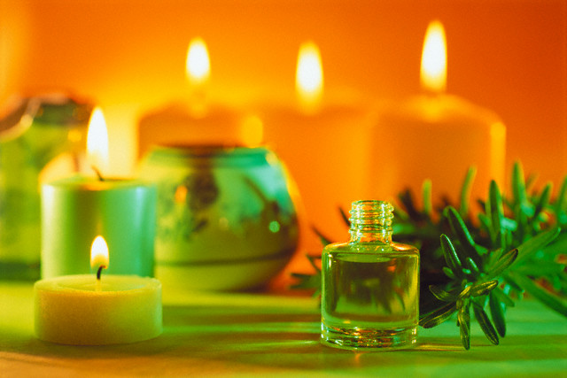 Aromatherapy Oil and Candles --- Image by © David Aubrey/CORBIS